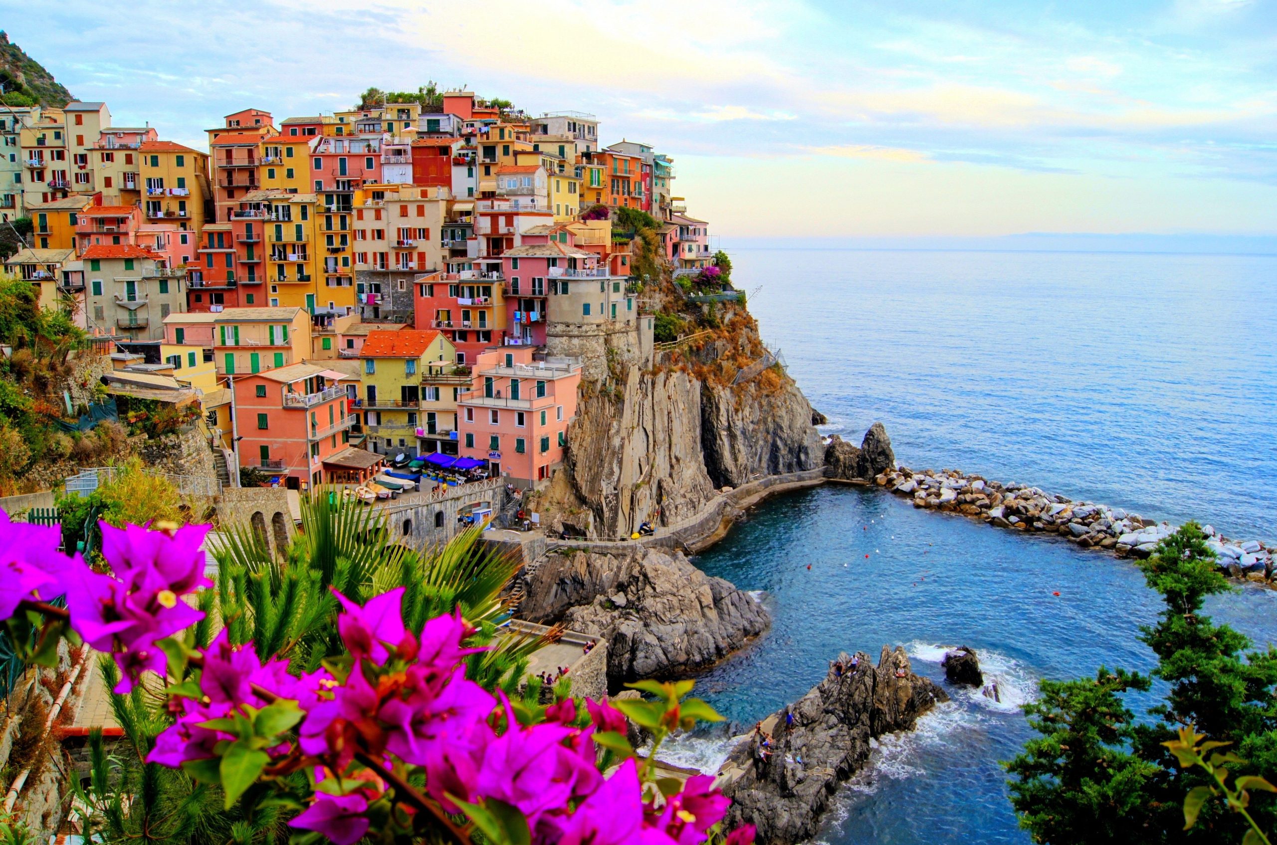 Colorful houses stacked on the cliffs of an Italian seaside village